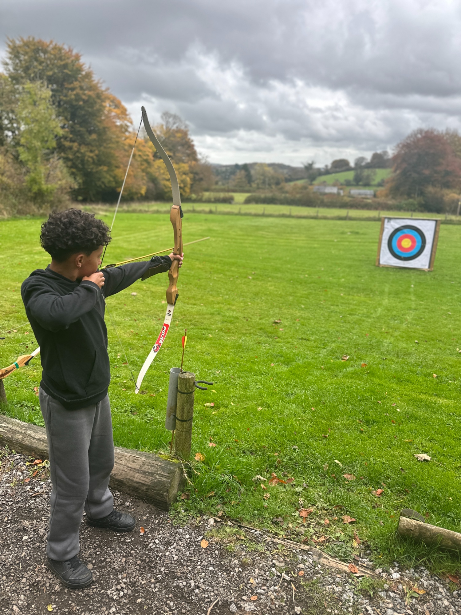 Y6 pupil enjoying archery at Heatree